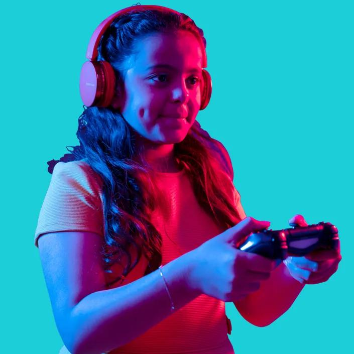 Image of a kid with the controller wearing headphone