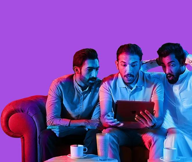 Image of 3 guys with a tablet