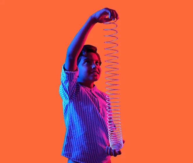 Image of a kid playing with spiral