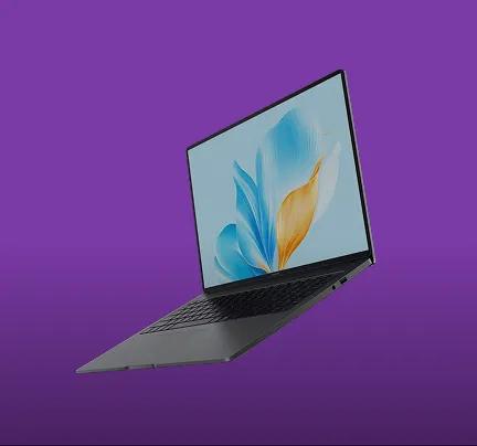 slim laptop open on purple background