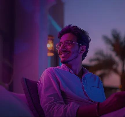 person using laptop comfortably at home