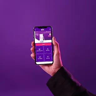 Self-Care Portal holding a mobile device