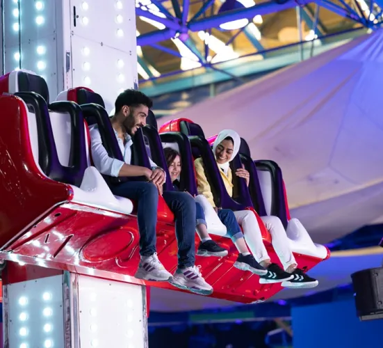 A guy and a girl on a ride